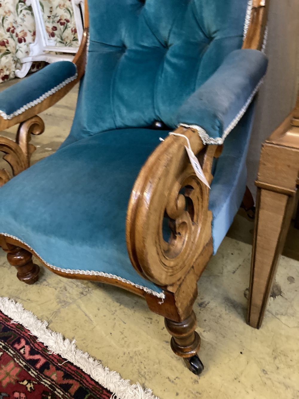 A Victorian mahogany button back back armchair
